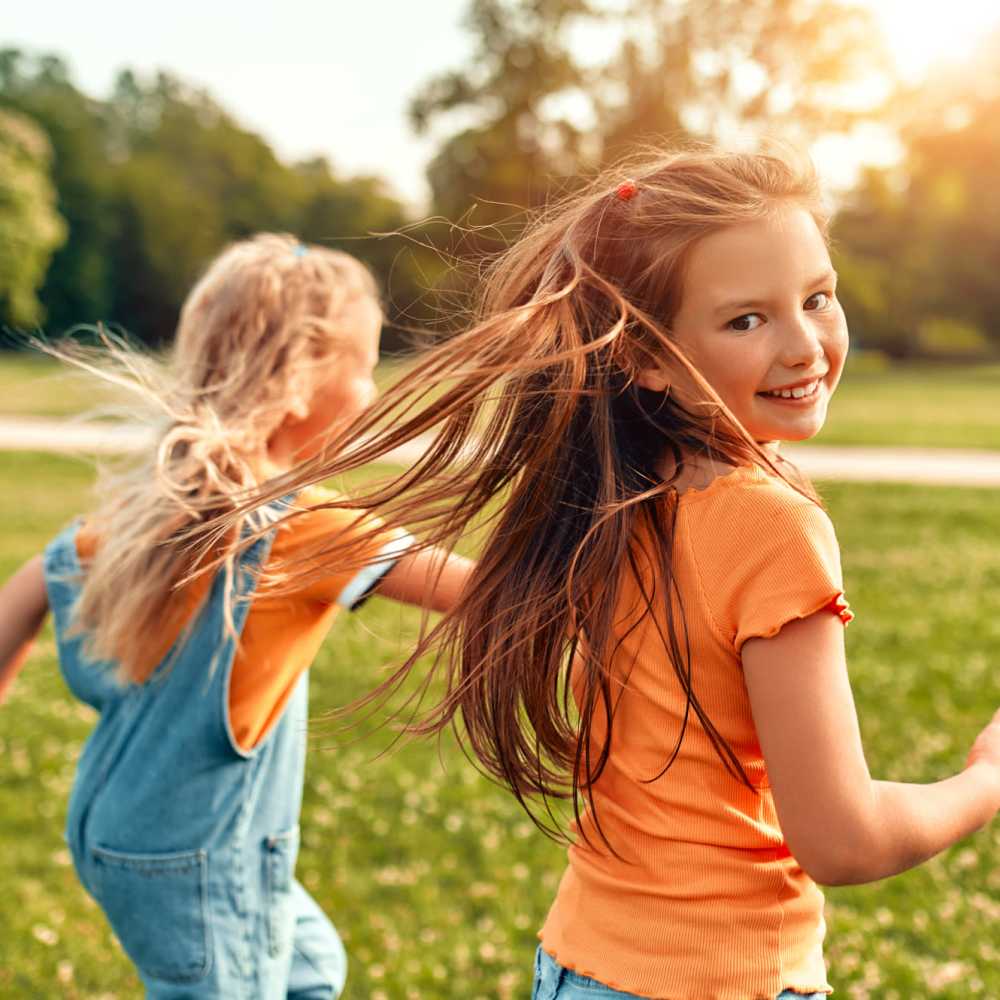 Friends in a park at Ranch Creek Living in Helotes, Texas