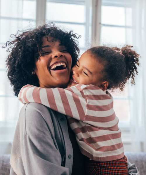 Resident with her daughter near Pheasant Run Townhomes in Harrisonburg,Virginia