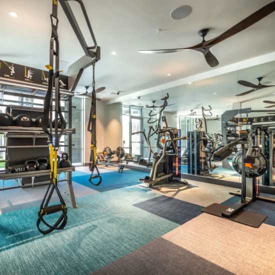 Well-equipped fitness center at Cornell Midtown in Dallas, Texas