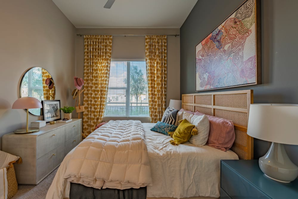Cozy bedroom with a large window at Encore Tessera in Phoenix, Arizona