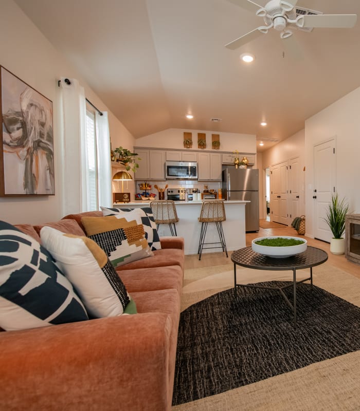 Model living room and kitchen at Chisholm Pointe in Oklahoma City, Oklahoma