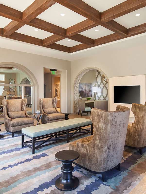Seating area in clubhouse at Skye Apartments in Vista, California