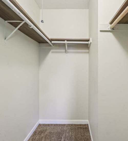 Walk-in closet at Regents Park Apartments in Bensenville, Illinois