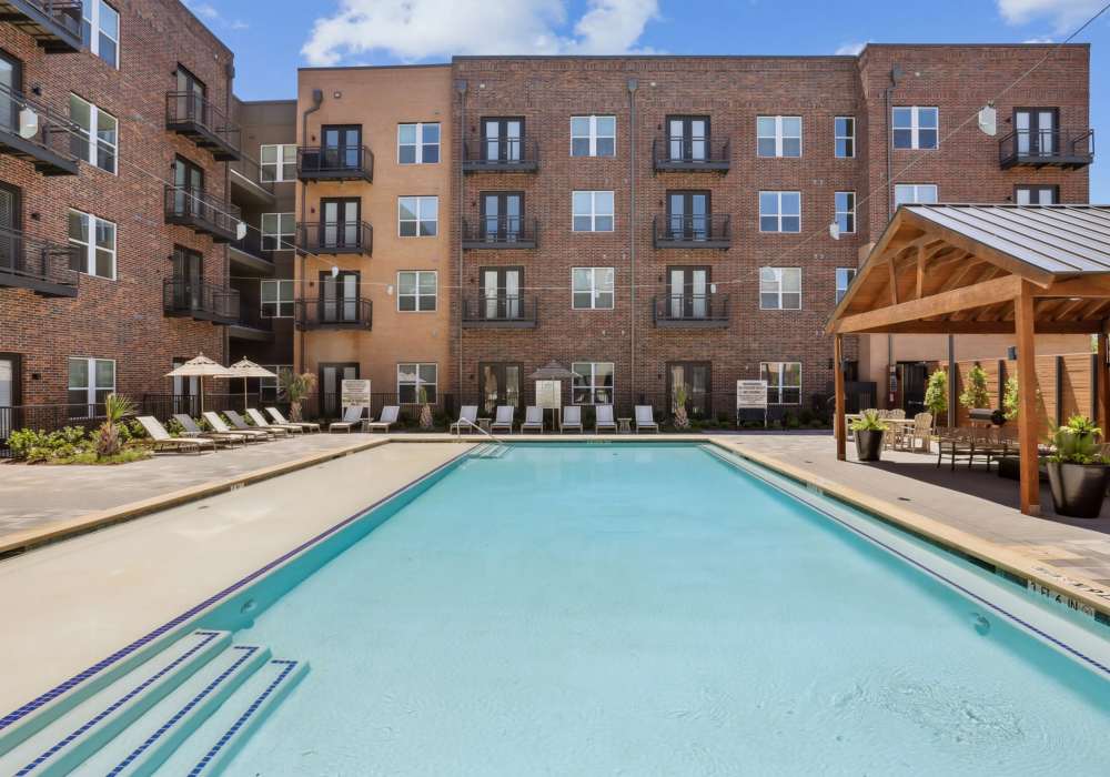 Resident in pool at Heritage McKinney Square in McKinney, Texas