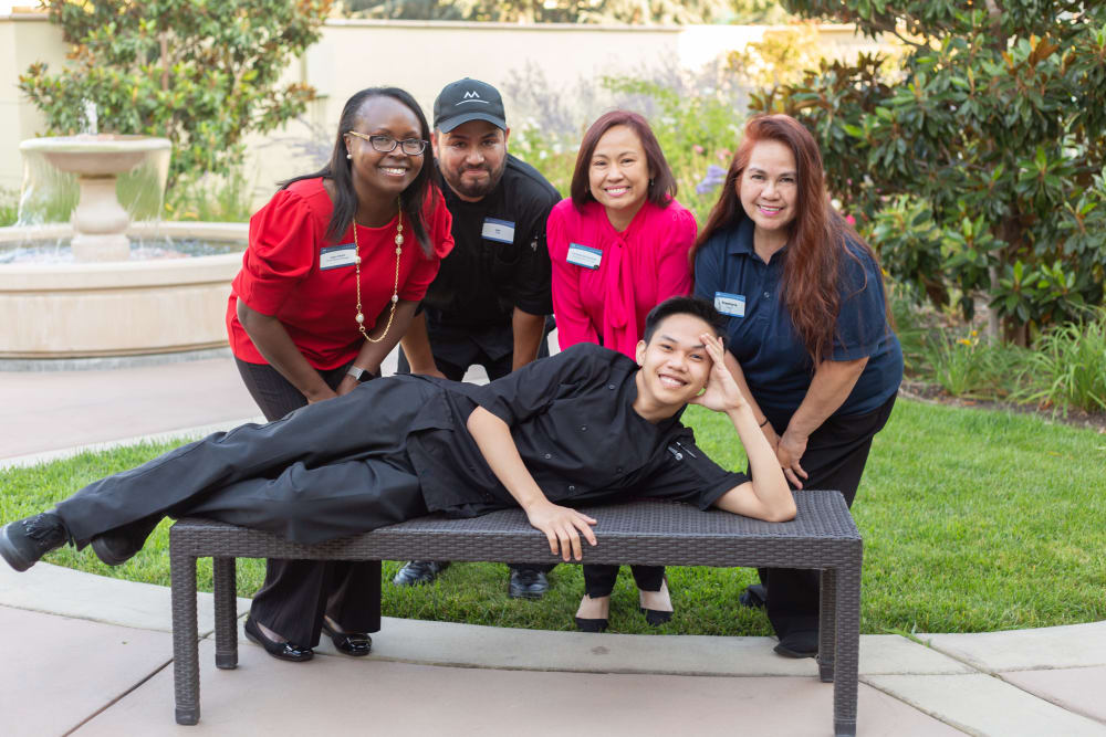 team members smiling together at Merrill Gardens at Campbell in Campbell, California. 