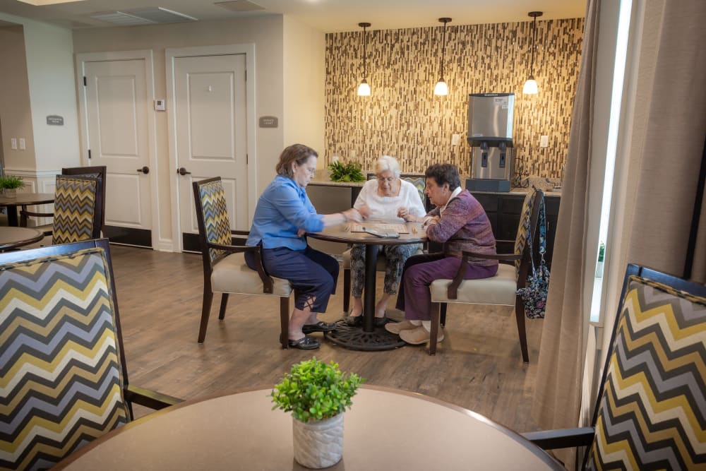 Residents at happy hour at Harmony at Five Forks in Simpsonville, South Carolina