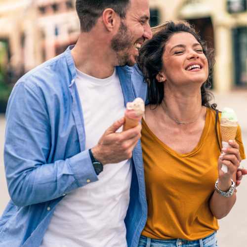 Happy couple eating ice cream near Cordoba in Doral, Florida