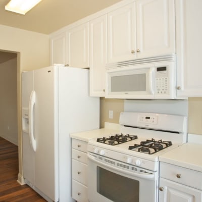 A kitchen with appliances in a home at San Onofre II in San Clemente, California