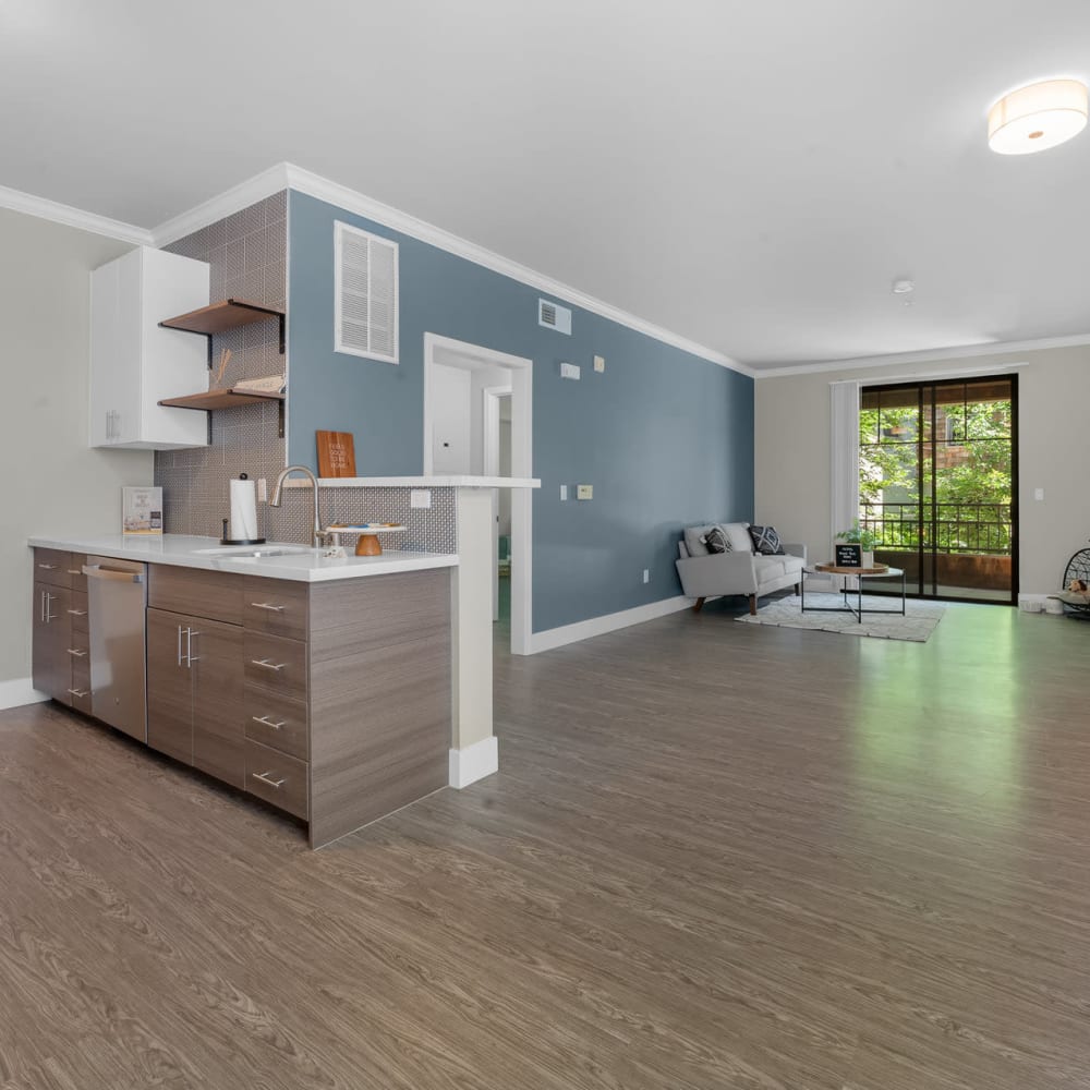 Open floor plan with blue wall at Town Center Apartments in Lafayette, California