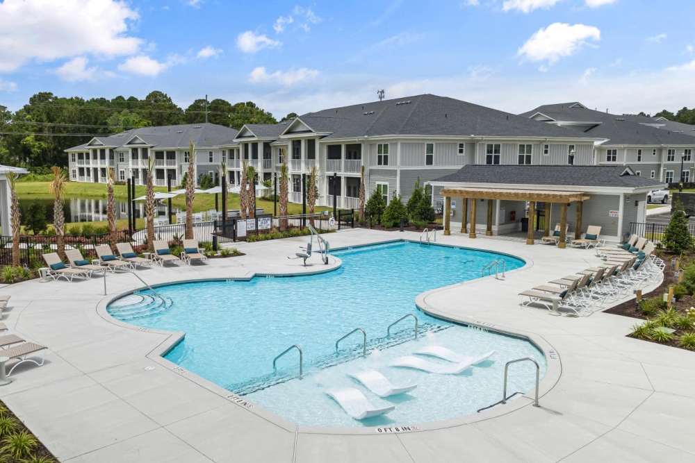 Resort-style large swimming pool and clubhouse at  Hudson Carolina Forest in Myrtle Beach, South Carolina