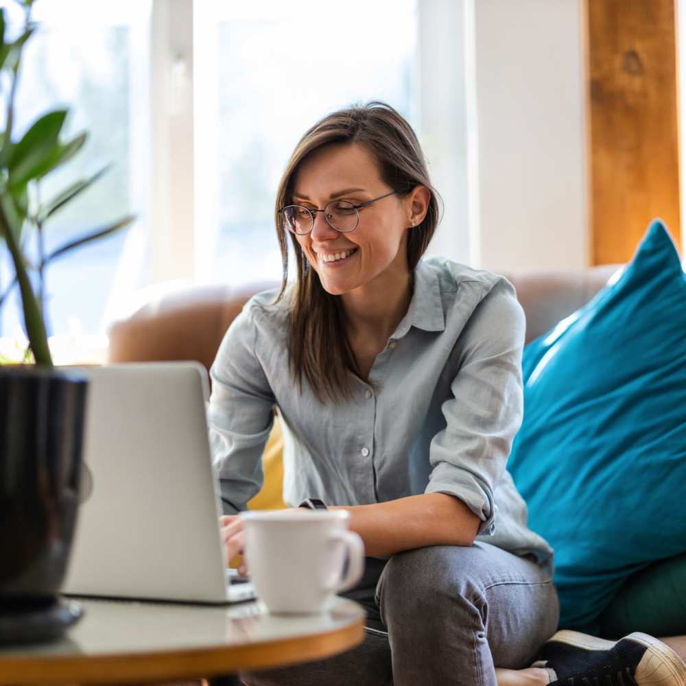 Resident couple surfing the web in their new apartment at Oaks Pentagon Village in Edina, Minnesota