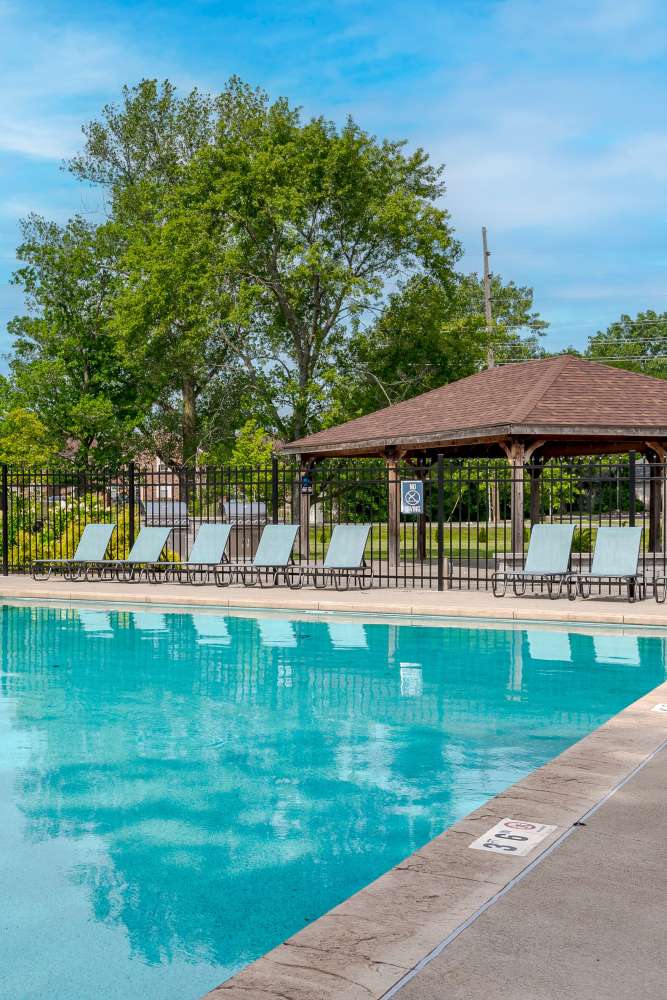 Sundeck patio table by the swimming pool at Lakeshore Reserve Off 86th in Indianapolis, Indiana