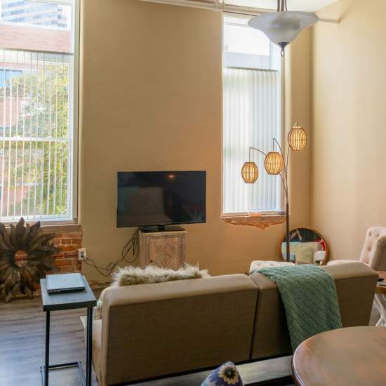 Fully equipped kitchen with stainless steel appliances at Main Street Living in Columbia, South Carolina