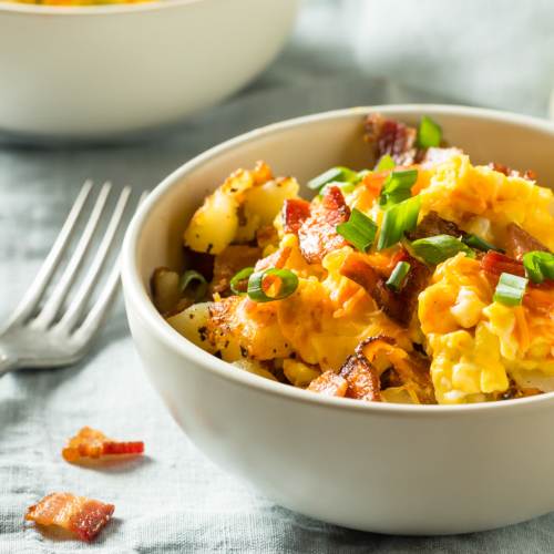 Bowl of scrambled eggs with bacon and green onions near Chesterfield Terrace in Parma, Ohio