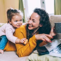 Mother and daughter in model apartment at Ashford Lakes in Houston, Texas
