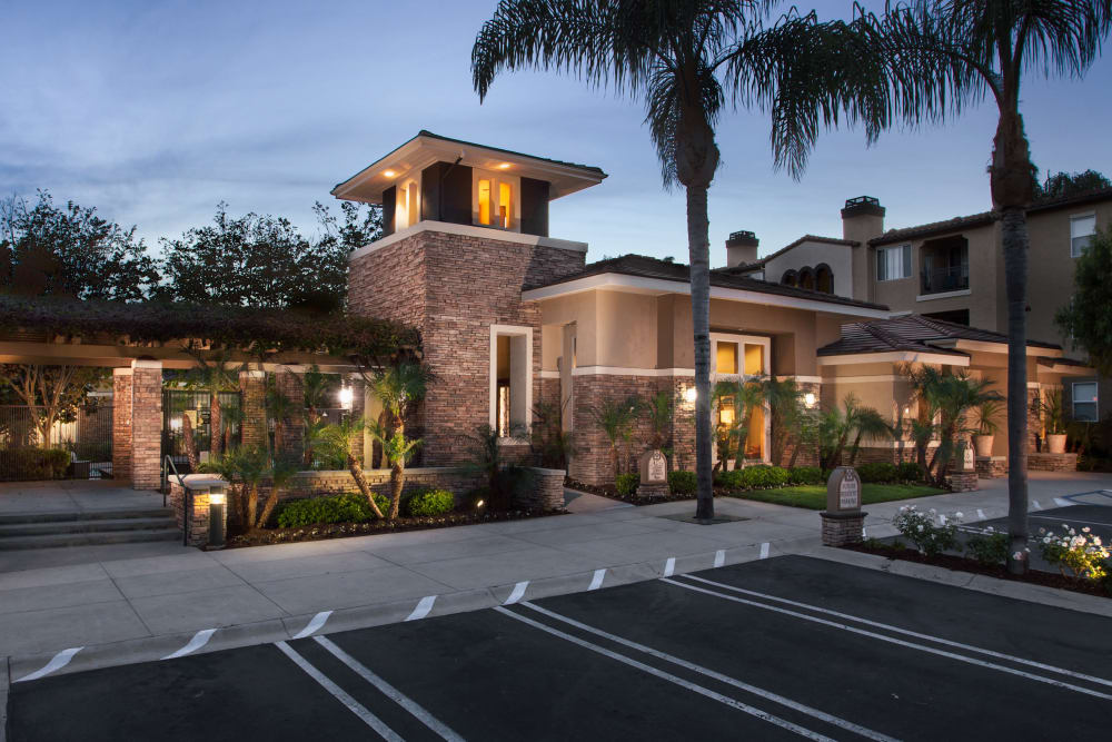 Building exterior at sunset at Alize at Aliso Viejo Apartment Homes in Aliso Viejo, California