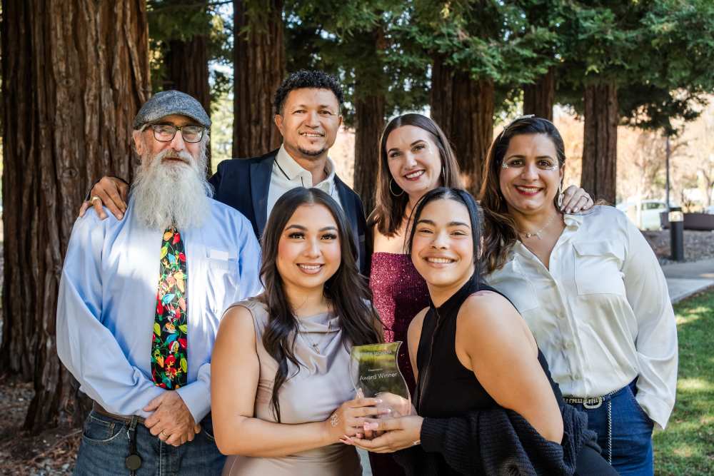 Sequoia team members accepting an award at the annual Holiday Luncheon
