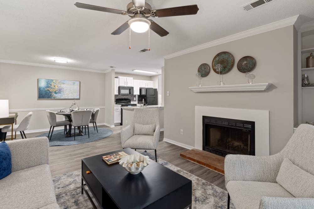 An open apartment living room, dining room and kitchen at Lenox Gates in Mobile, Alabama