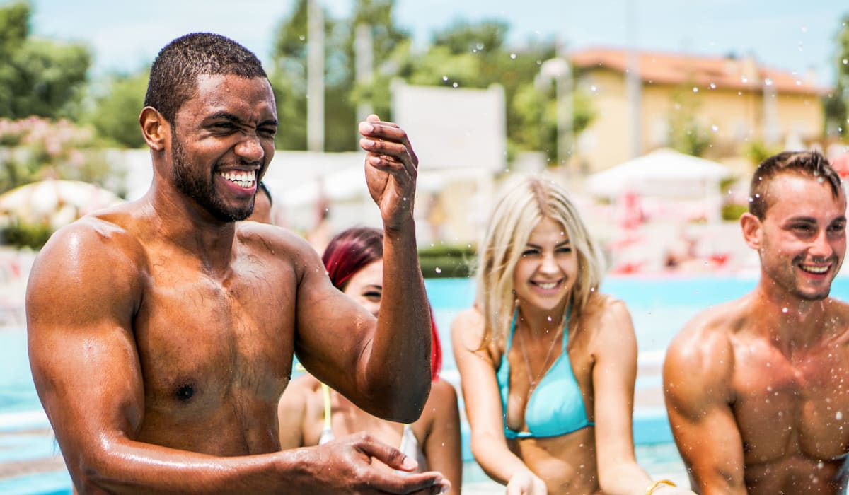Residents enjoying the pool at The Colony Uptown in San Antonio, Texas