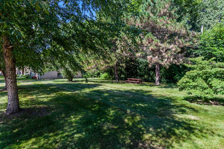 Lush grounds at Long Pond Gardens Senior Apartments in Rochester, New York