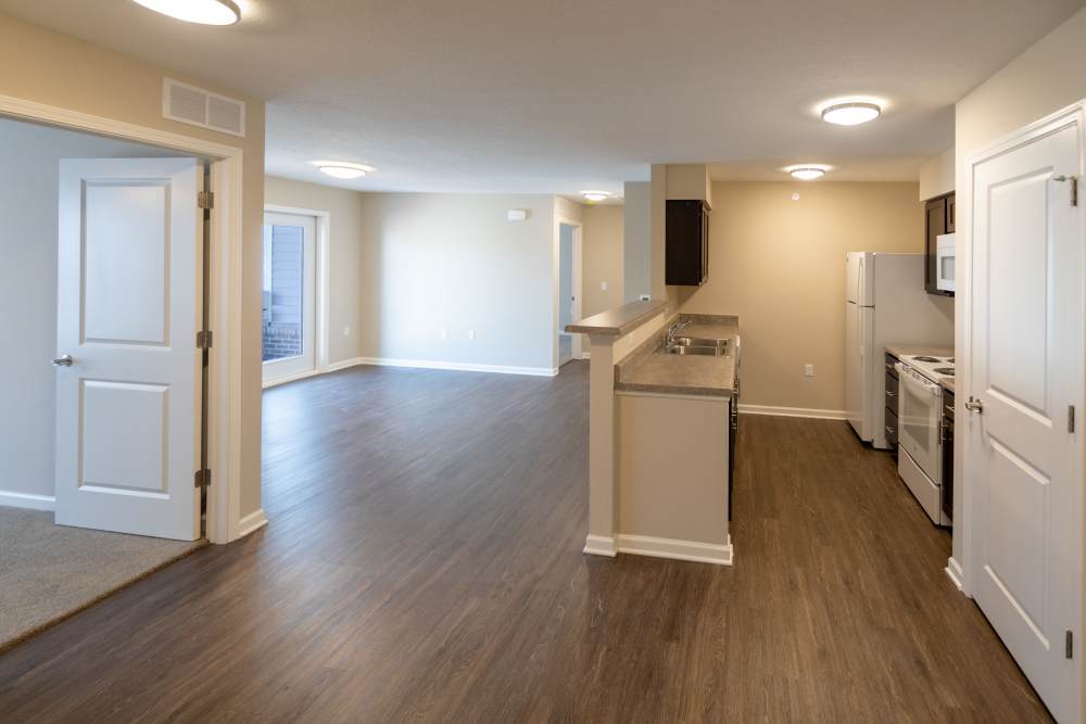 Living room with access to kitchen at Anderson Greene I in Cedar Rapids, Iowa