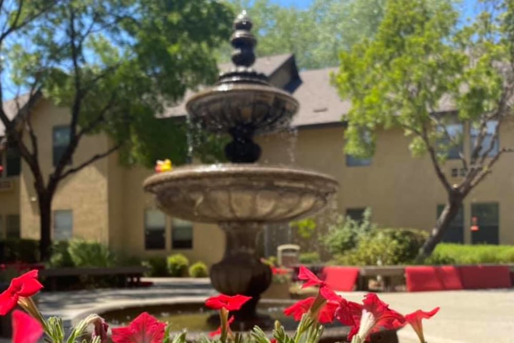 Courtyard with fountain at Hilltop Commons Senior Living in Grass Valley, California