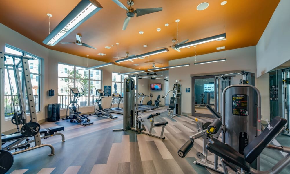 Full fitness center with everything to get a good workout in at Bellrock Upper North in Haltom City, Texas