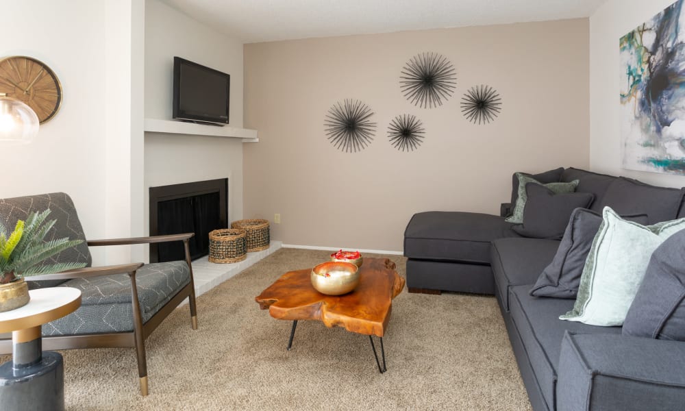 An apartment living room with furniture at Mountain Village in El Paso, Texas