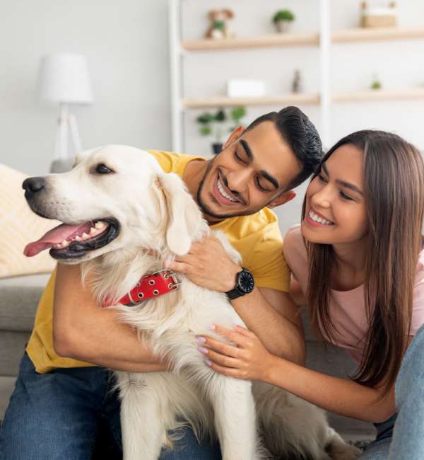 Happy residents in the living room at Henry Heights in Austin, Texas
