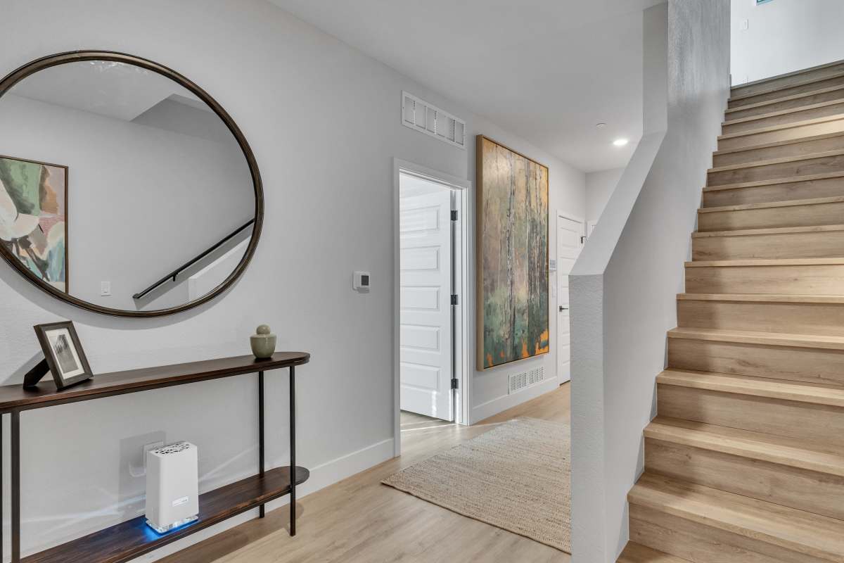 Entry way & stairs leading to bedrooms 