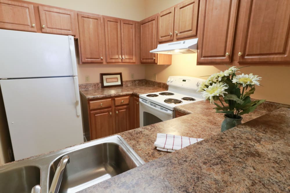 Kitchen, refrigerator, wood cabinets