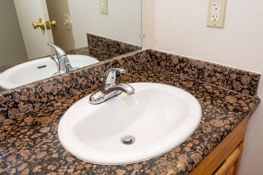 Granite Bathroom Vanity at Peppertree Apartment Homes, in San Jose, California.