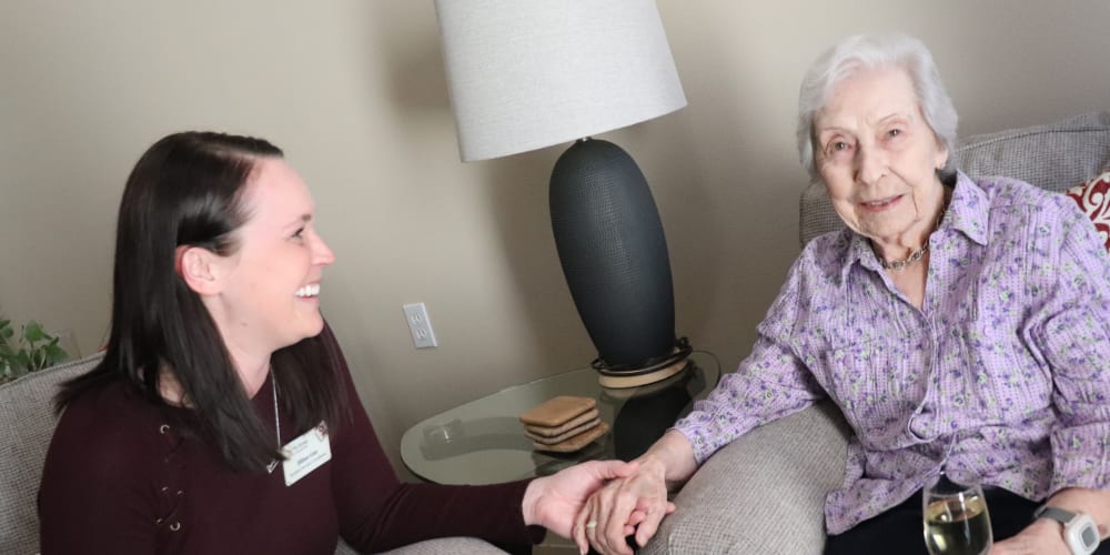 Resident with caregiver at The Springs at Grand Park in Billings, Montana