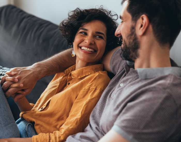 Happy couple in apartment at Hayu Tilixam in Portland, Oregon