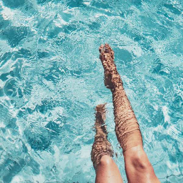 A resident enjoys the pool at Elevations One, Woodbridge, Virginia