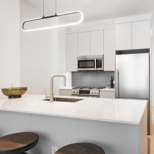  Rendering luxurious kitchen apartment at 8 Court Square in Long Island City, New York