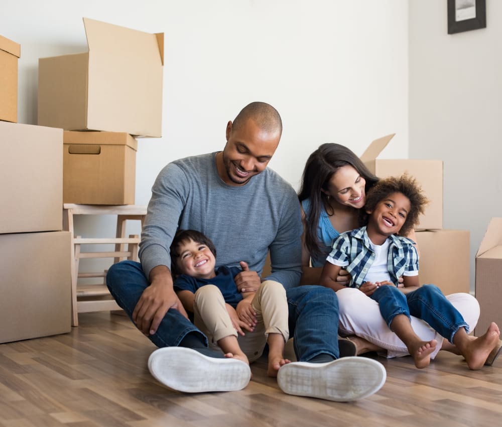 a family packing for storage at Advantage Self Storage - Thompson Creek Rd in Stevensville, Maryland