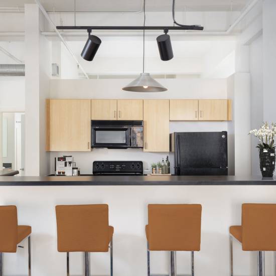 Fully equipped kitchen at Grand Lowry Lofts in Denver, Colorado