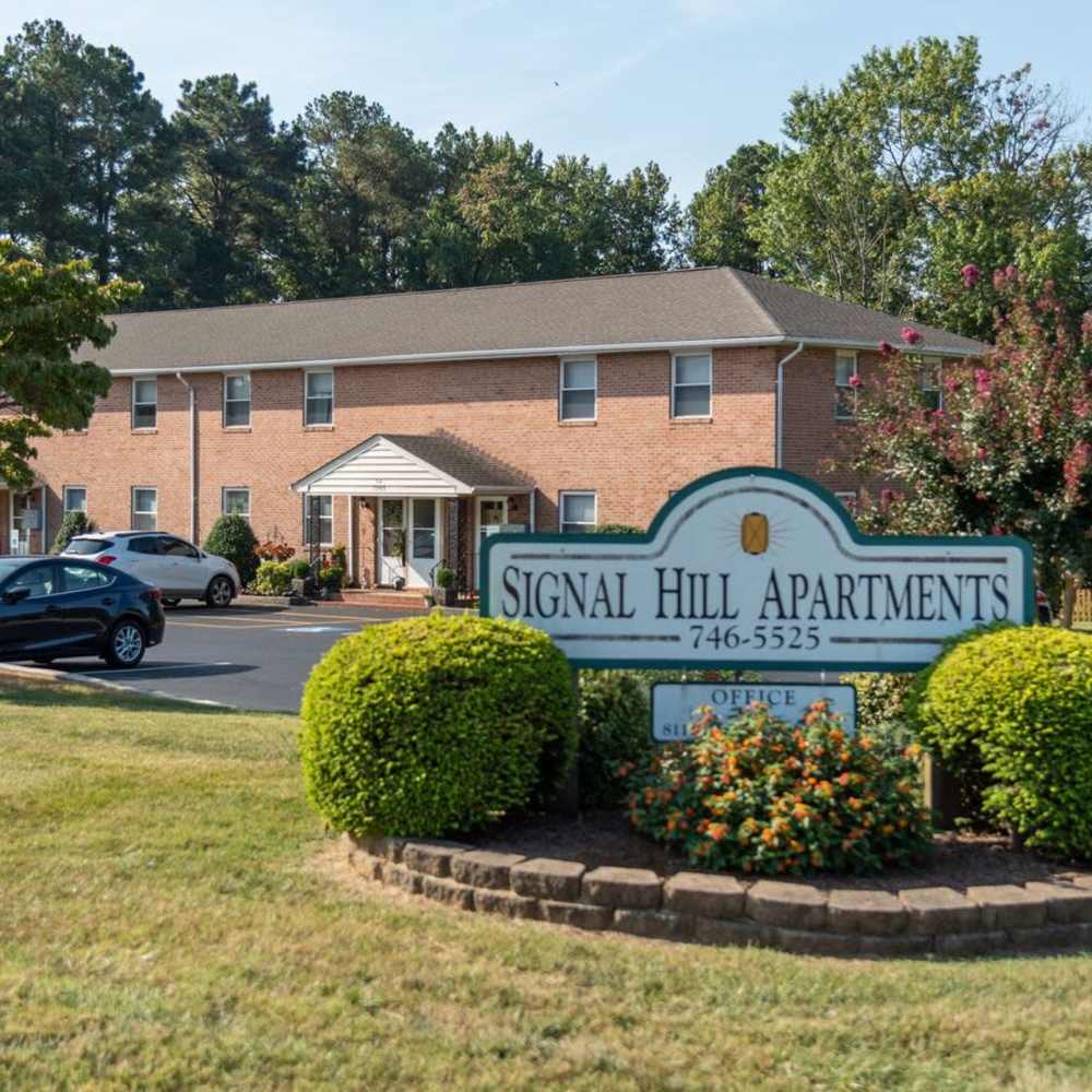 Welcome signage board at Signal Hill Apartments in Mechanicsville, Virginia
