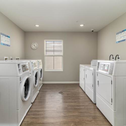 Wahser and dryers in the laundry area at Haven Crossing in Walton, Kentucky