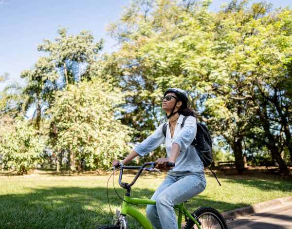 Resident cycling in a park near Lodge at Croasdaile Farm in Durham, North Carolina
