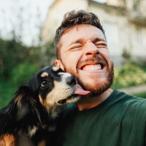 Resident with his pet at Crystal Lake Apartments in Crystal Lake, Illinois