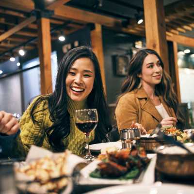 Friends enjoying some delicious food at a local hot spot near Lakeview in Reno, Nevada