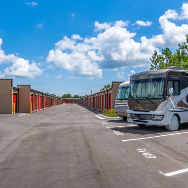 Drive-up access storage units and outdoor RV parking at StorQuest Self Storage in Lakeland, Florida