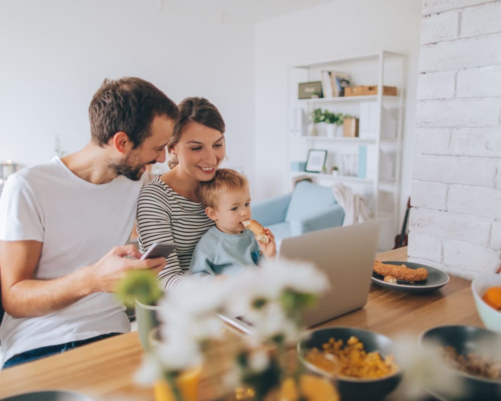 a family in the kitchen at Park Crest Apartments in Athens, Tennessee