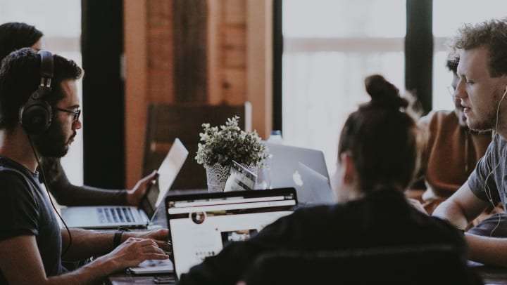 colleagues working in a small business office space
