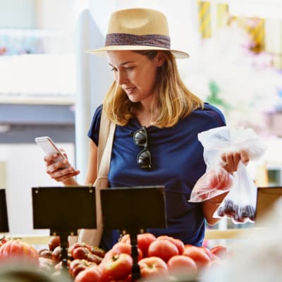 A resident shopping for produce near Midway Park in Lemoore, California