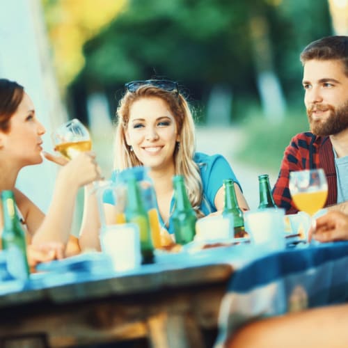 Residents having a meal in restaurant at The Residences at Annapolis Junction in Annapolis Junction, Maryland