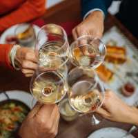 Residents enjoying drinks in a nearby restaurant at Ashford Lakes in Houston, Texas