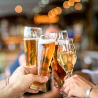 Resident family toasting at a restaurant near Renaissance At North Park in Lubbock, Texas